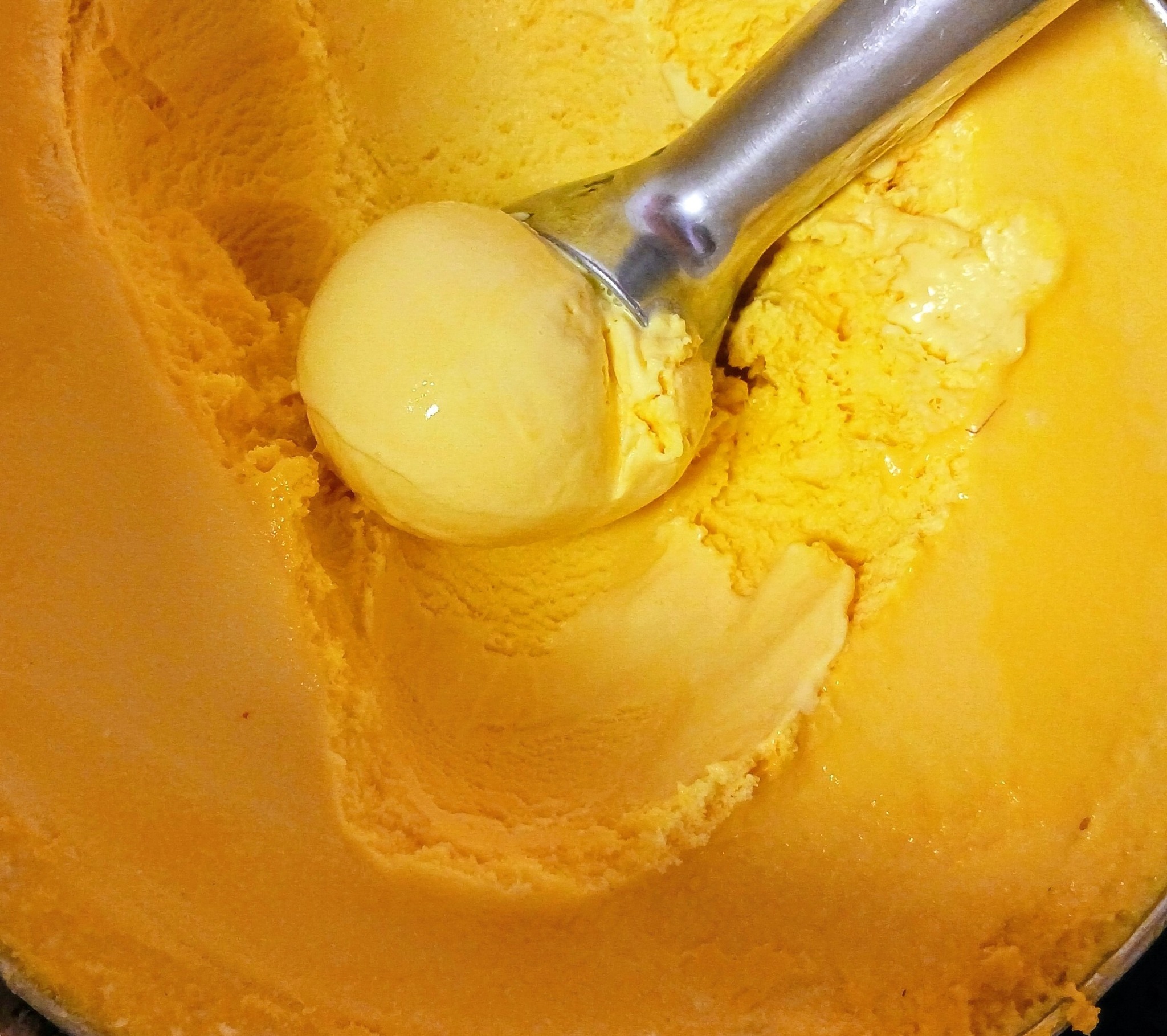 Fresh ice cream scoops being served